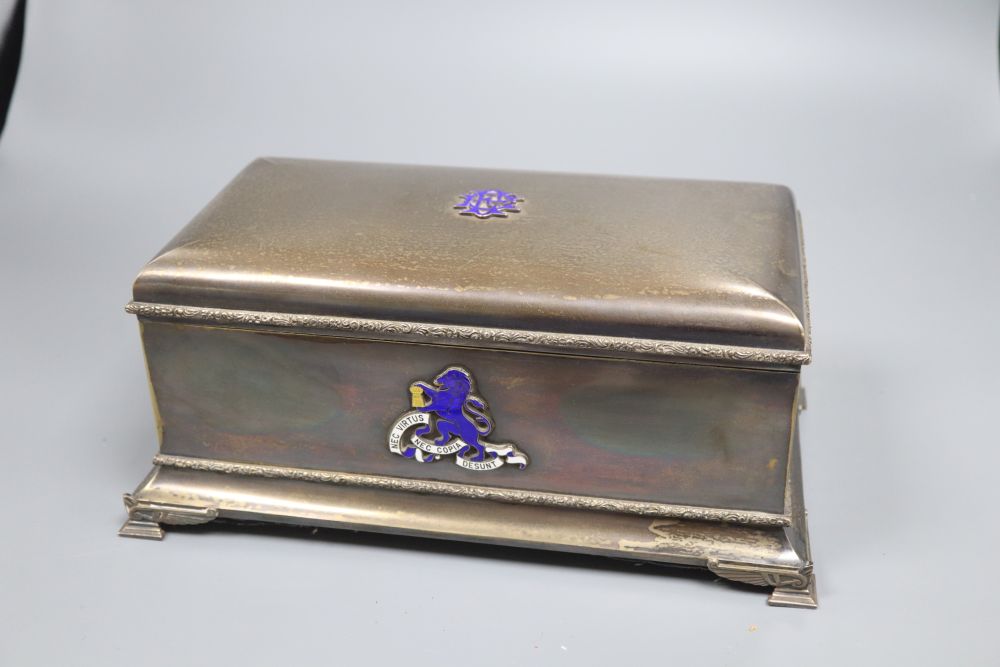 A George VI silver rectangular presentation casket, with enamelled appliques, in a blue leather box